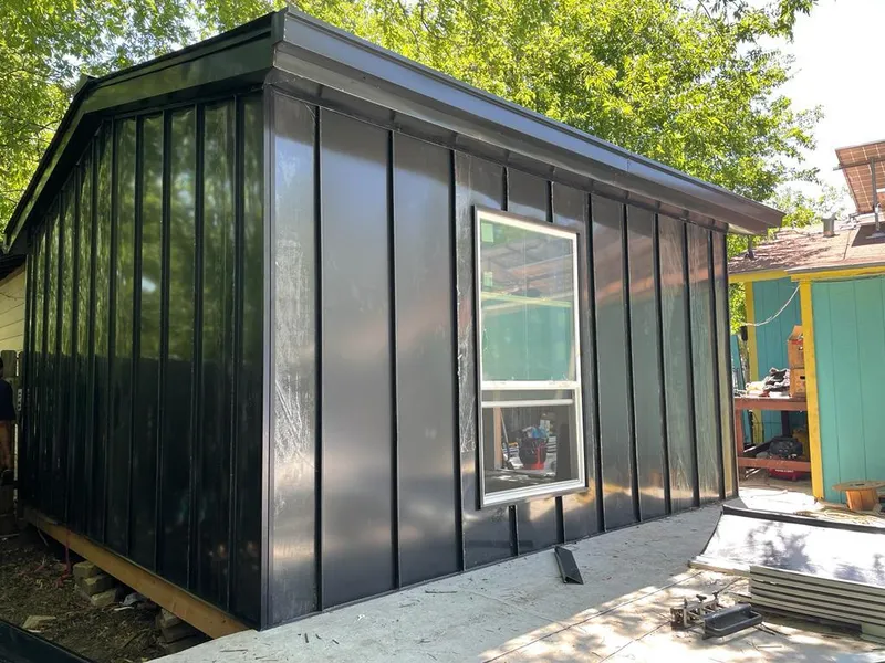 Black standing seam metal wall panels for Metal Roof Installation in Papillion