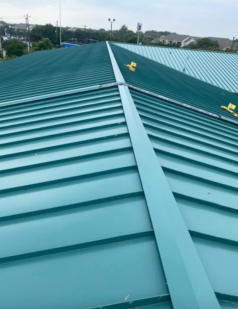 Green commercial metal roof ridge and valley for Metal Roof Repair in Papillion