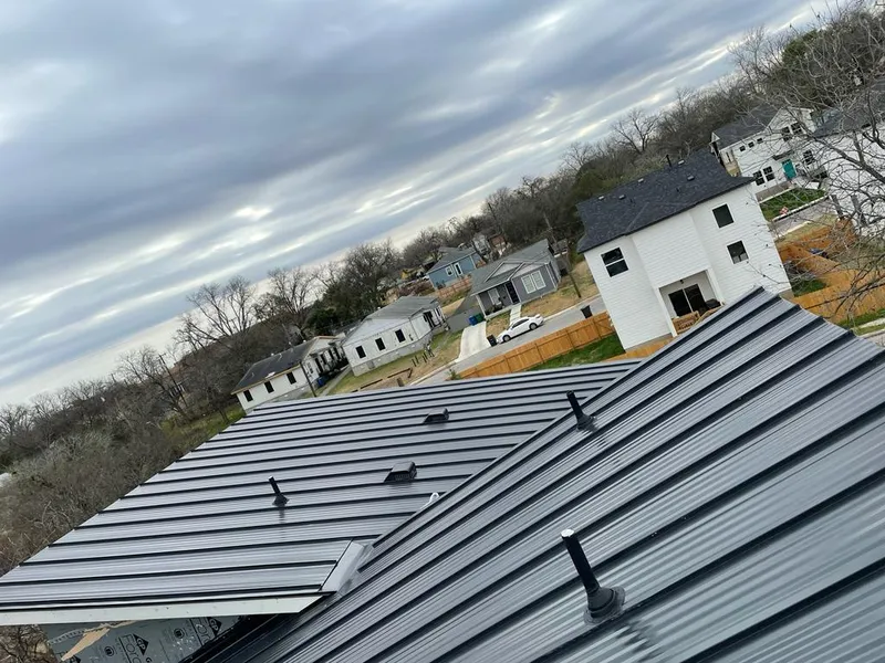 Standing seam metal roof panels with vents for Skylight Repair in Papillion
